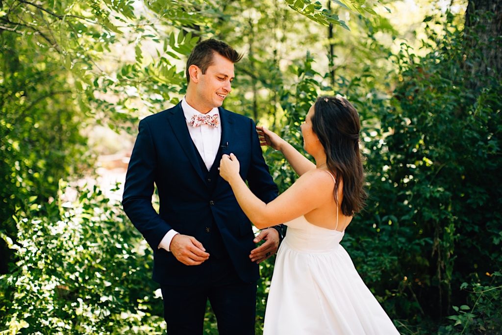 Bride and groom see each other for the first time before their wedding at Planet Bluegrass