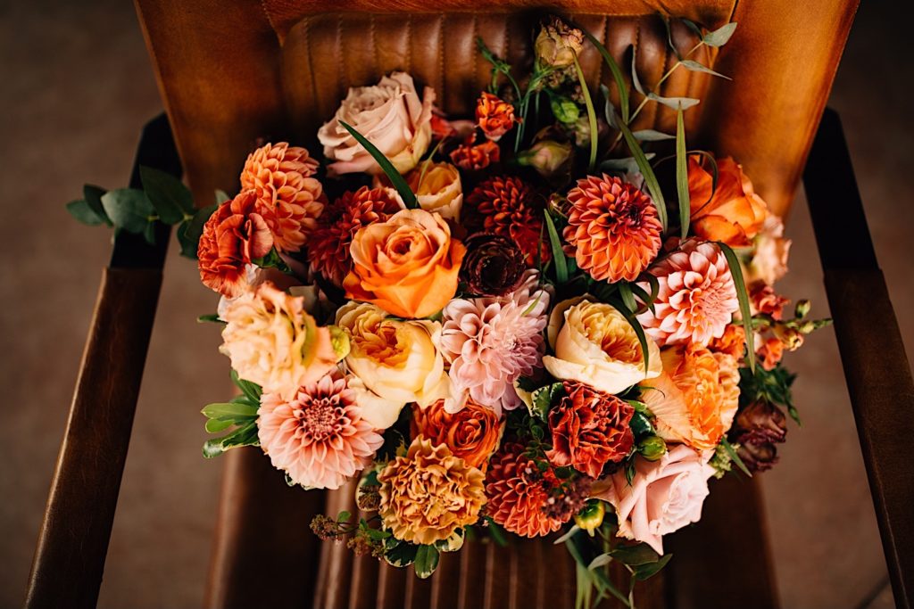 Bouquet of flowers on a leather chair